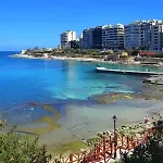 Апартаменты Sleek 2br By The Promenade *